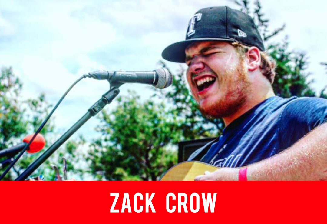 Zack Crow singing at a free concert at the DFW RV Show
